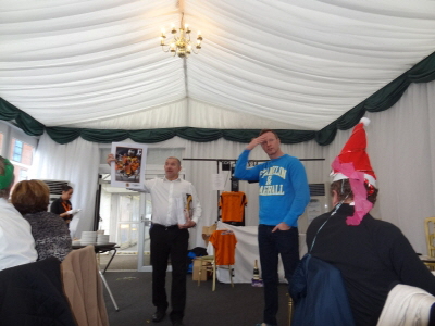 ASC05370 Paul selling the brochure Jody showing the bandage ASC05370 Paul selling the brochure Jody showing the bandage